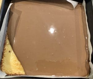 pouring chocolate on top