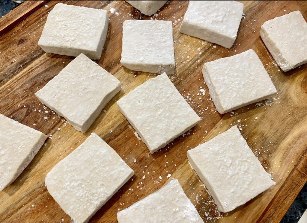 coating the tofu in flour