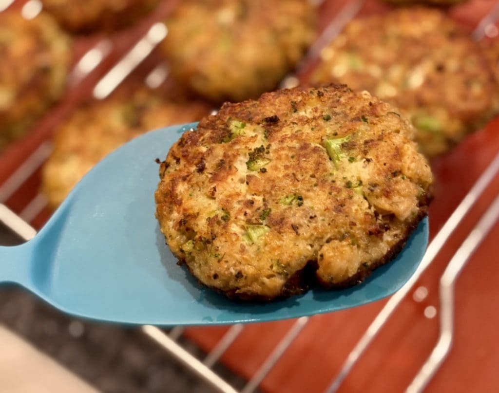 frying the salmon patties cheese