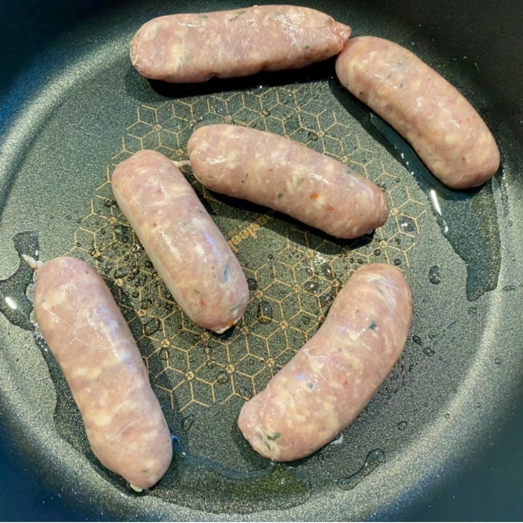 cooking the sausages