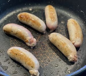 cooking the sausages
