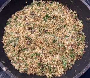 Golden anchovy breadcrumbs with parsley toasted until crisp in a frying pan