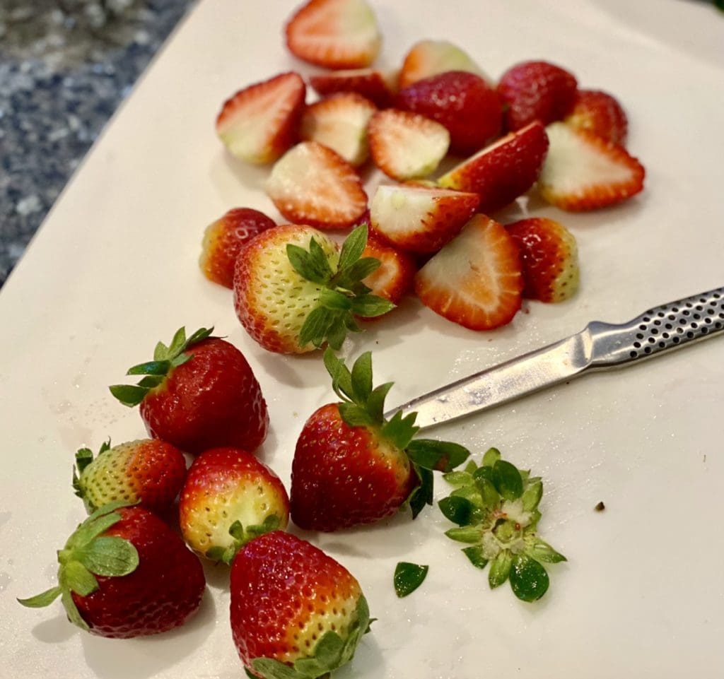 slicing strawberries