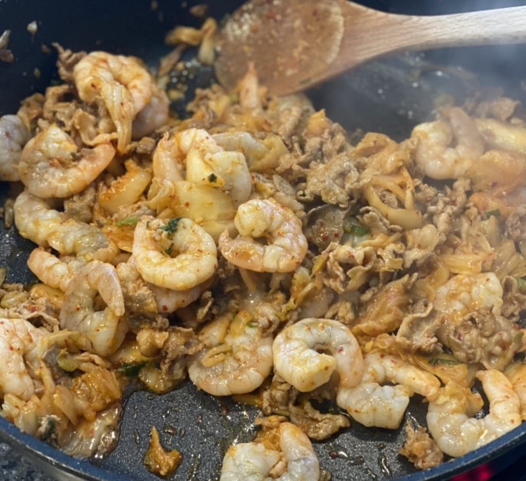 stir frying the rice