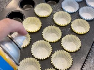 Spraying muffin tin