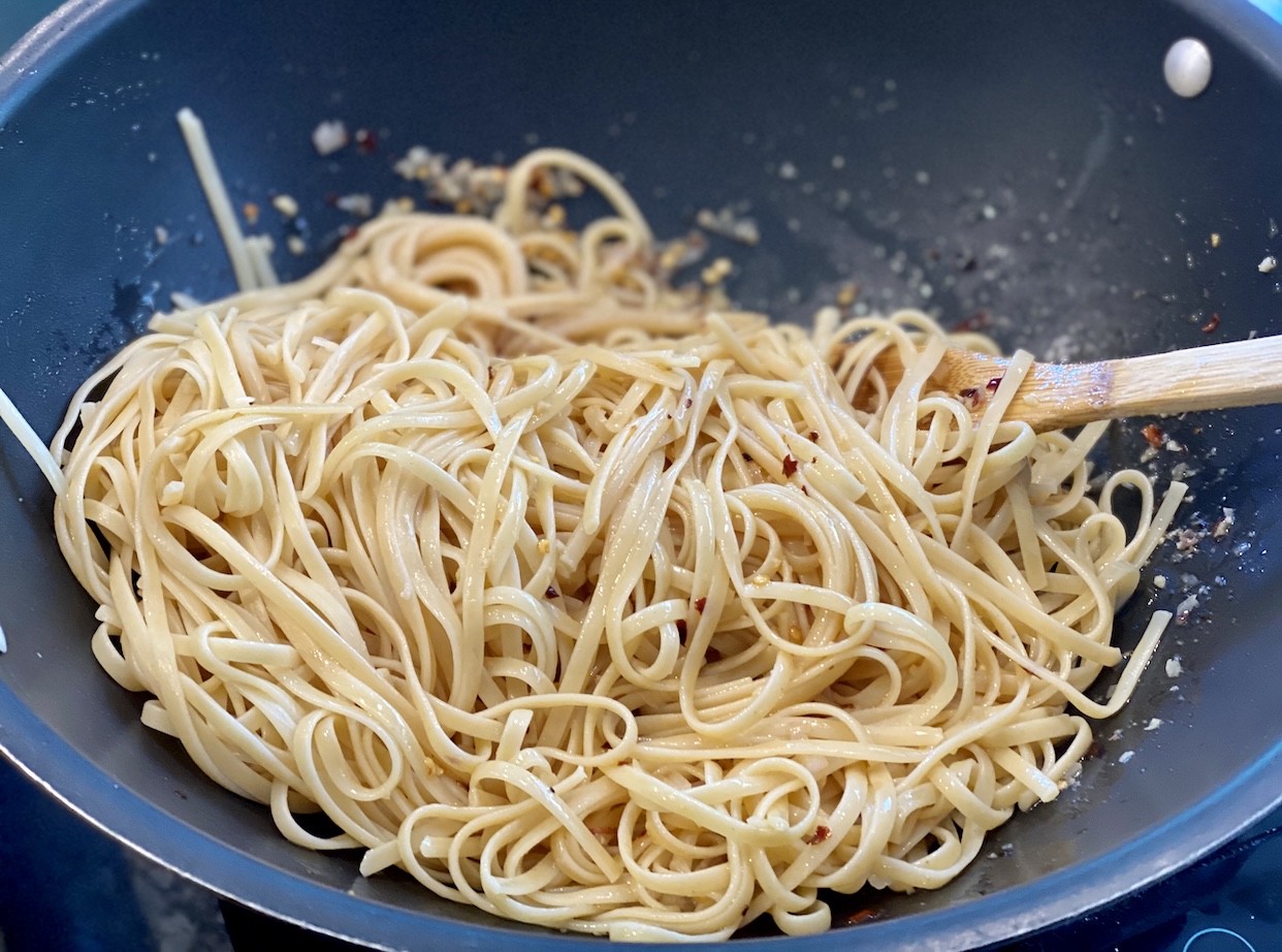 adding pasta