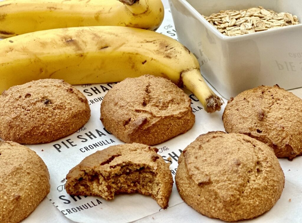 Banana Oat Cookies for babies. One with a bite mark 