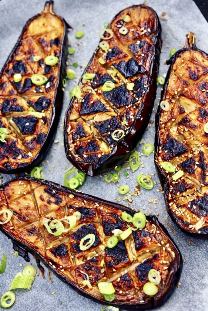 Japanese-style honey miso eggplant roasted until sticky and golden, finished with sesame seeds and spring onions