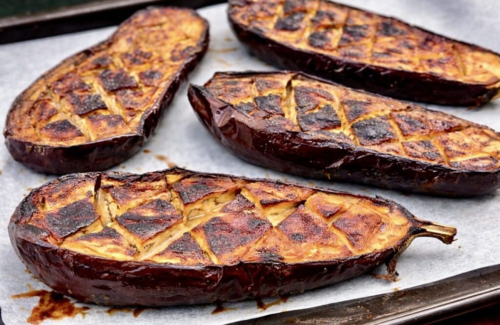 Sticky honey miso eggplant halves roasted until caramelised.