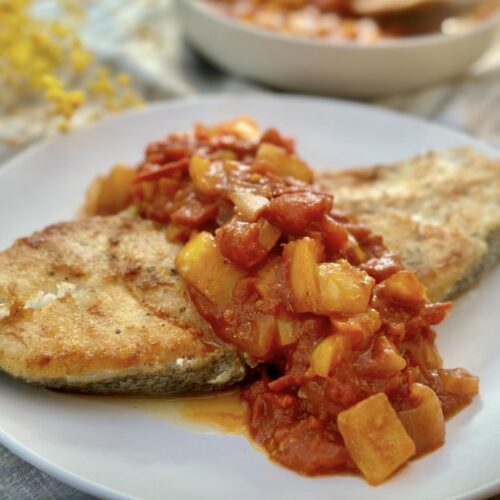 Easy fish in tomato sauce served as a healthy Mediterranean dinner