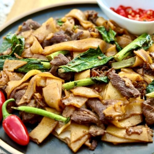 Pad see ew made with chewy flat rice noodles, sliced beef and Chinese broccoli with soy sauce