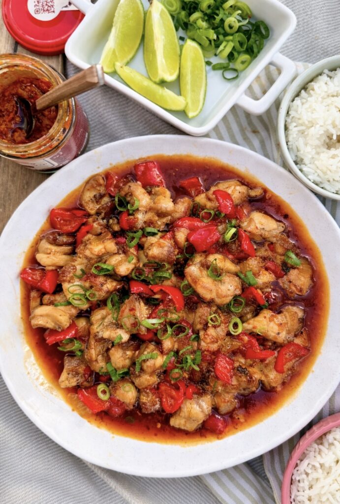 Honey sambal chicken plated and ready to serve, showing tender chicken pieces coated in a rich glossy sauce